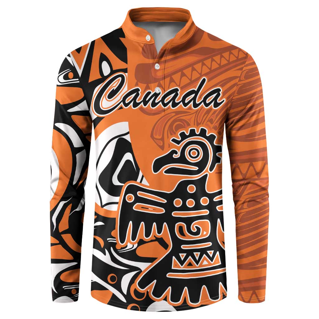 Orange button-up sweatshirt with Canada logo and Haida eagle graphic, long sleeves