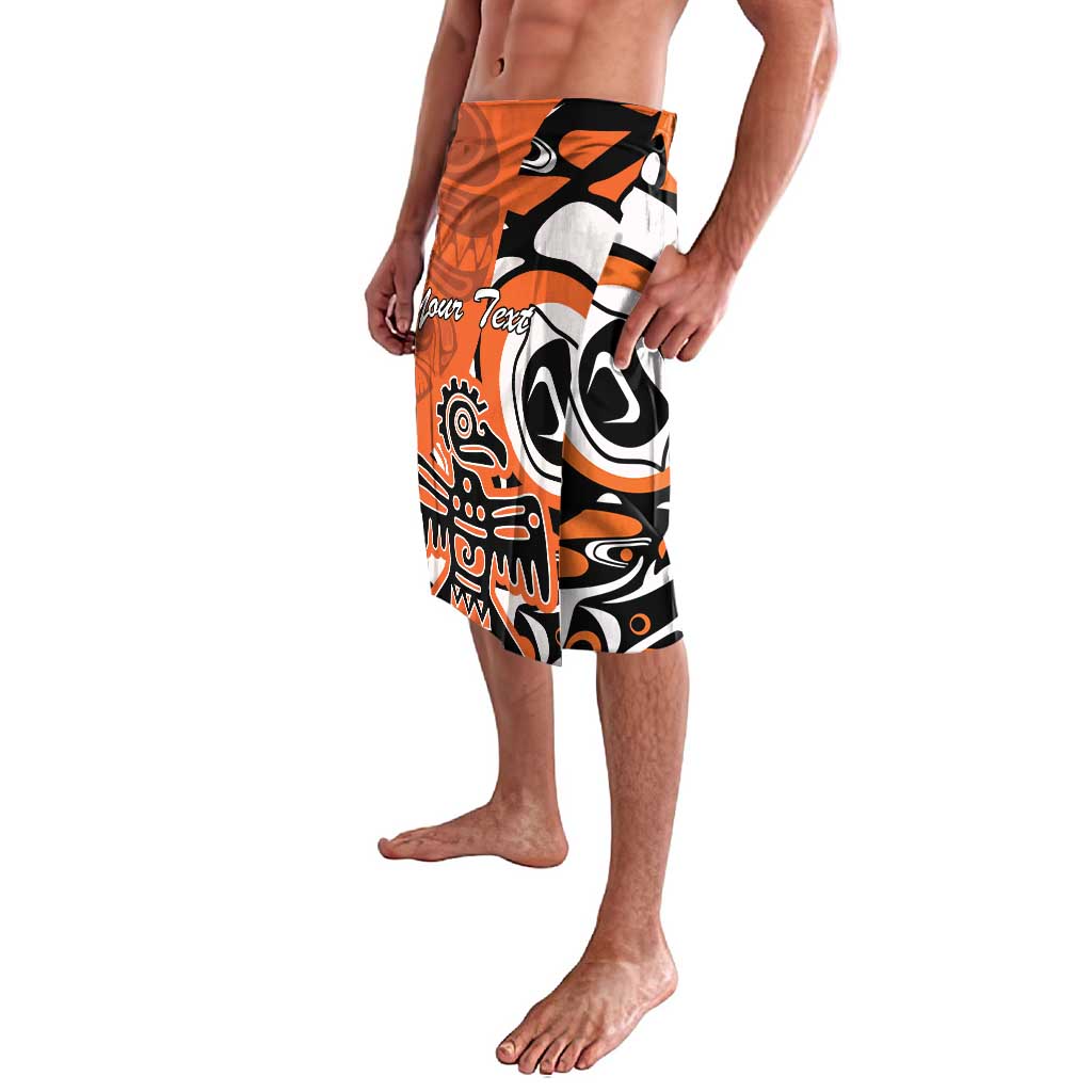 Orange and black abstract graphic swim shorts with elastic waistband, side leg view