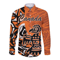 Orange long-sleeve button shirt with Canada text and Haida-style eagle graphic