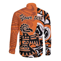 Orange long-sleeve button shirt with Haida-style eagle graphic and custom text