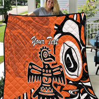 Orange quilt with Haida-style eagle graphic and “Your Text” in black and white