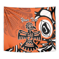 Orange Haida-style eagle tapestry with custom text, detailed crest and feather shapes