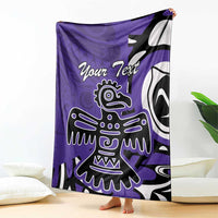 Purple blanket draped with eagle/Haida artwork and 'Your Text' across center