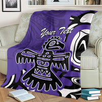 Purple eagle/Haida motif blanket draped on couch with 'Your Text'