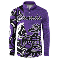 Purple button sweatshirt with Canada text and Haida eagle graphic, long sleeves.