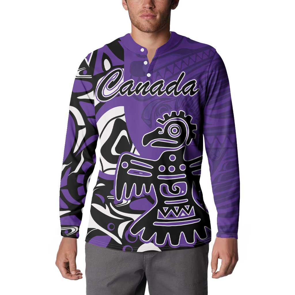 Purple button sweatshirt on model, Canada script and eagle crest graphic, long sleeves.