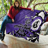 Purple quilt with custom text and Haida-style eagle graphic, shown outdoors