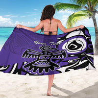 Purple sarong with Haida-style eagle print, black-and-white tribal detailing, tied at waist