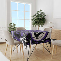 Purple tablecloth with bold tribal design in black, white, and purple tones
