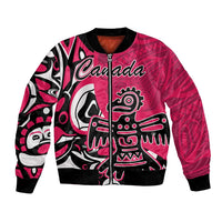 Pink bomber jacket with front zipper, Canada text, and Haida eagle-style graphic.