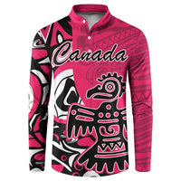 Pink button-front sweatshirt with bold black-and-white Haida eagle graphic and Canada print