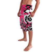 Pink and black tribal-patterned swim shorts shown side view