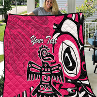 Pink quilt blanket with black and white Haida-style eagle graphic and custom text