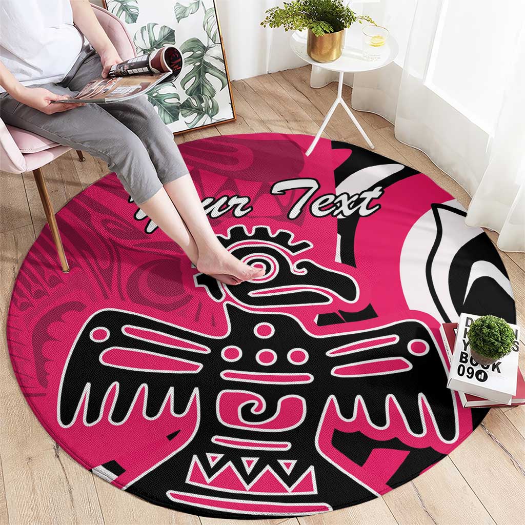 Pink round rug with Haida-style eagle artwork and 'Your Text' lettering in black white
