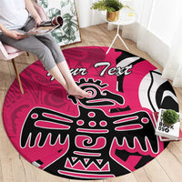 Pink round rug with Haida-style eagle artwork and 'Your Text' lettering in black white