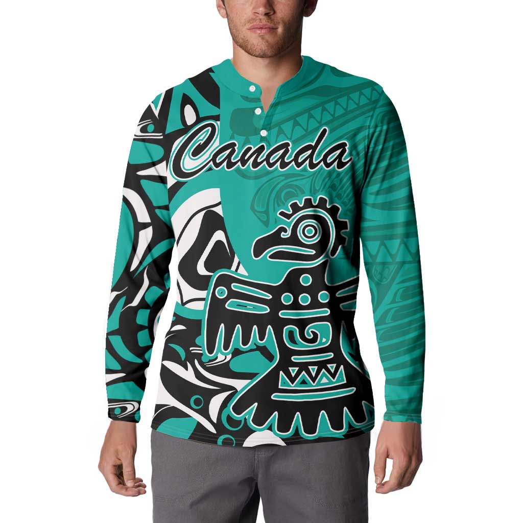 Men's turquoise button sweatshirt with Haida eagle graphic and 'Canada' front