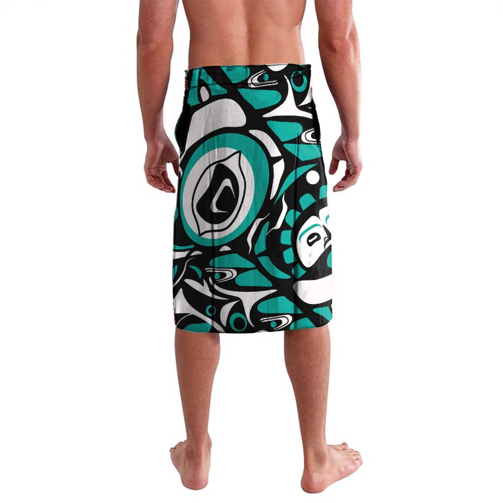 Turquoise and white tribal print board shorts with black eye-like motifs