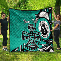 Turquoise quilt with large Haida-style eagle design and space for “Your Text”