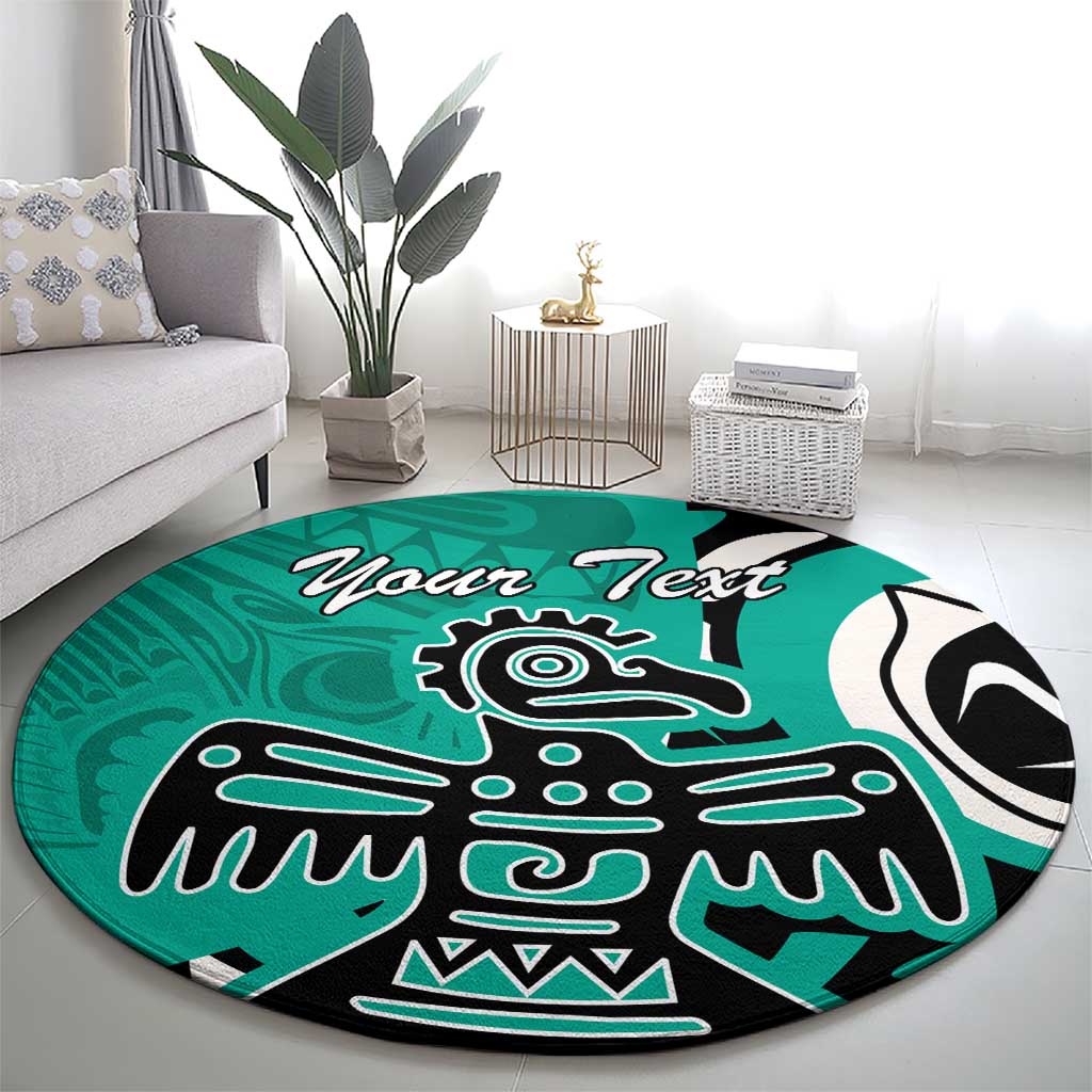 Turquoise round area rug with black and white eagle graphic and 'Your Text' lettering.