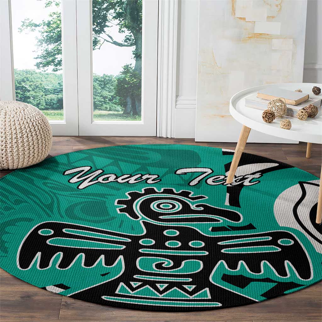 Turquoise round area rug with black and white eagle graphic and 'Your Text'.