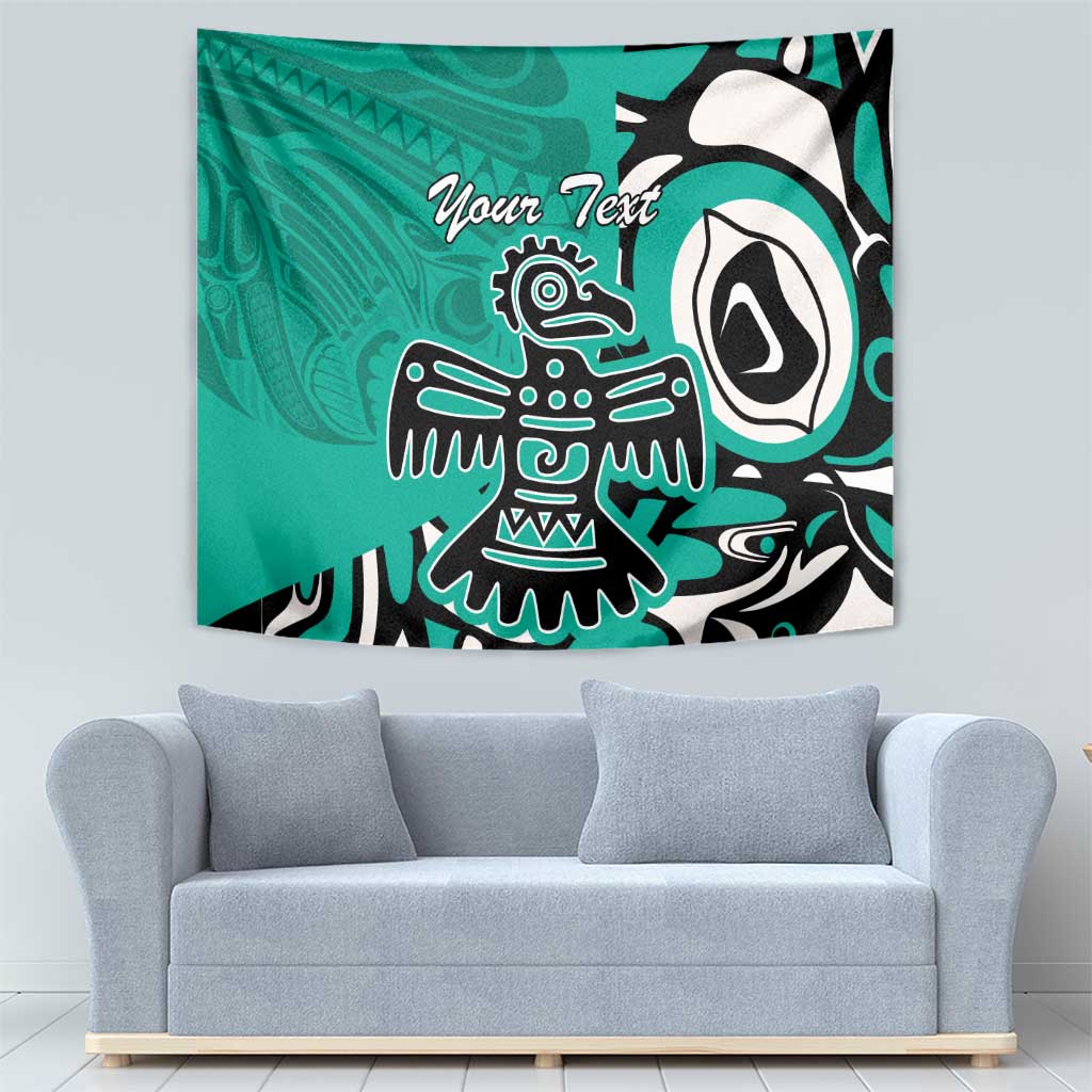 Turquoise wall tapestry showing Haida eagle motif and 'Your Text' text, black and white details.