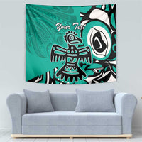 Turquoise wall tapestry showing Haida eagle motif and 'Your Text' text, black and white details.