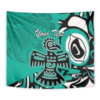 Turquoise wall tapestry with Haida-style eagle and 'Your Text' graphic, black and white accents.
