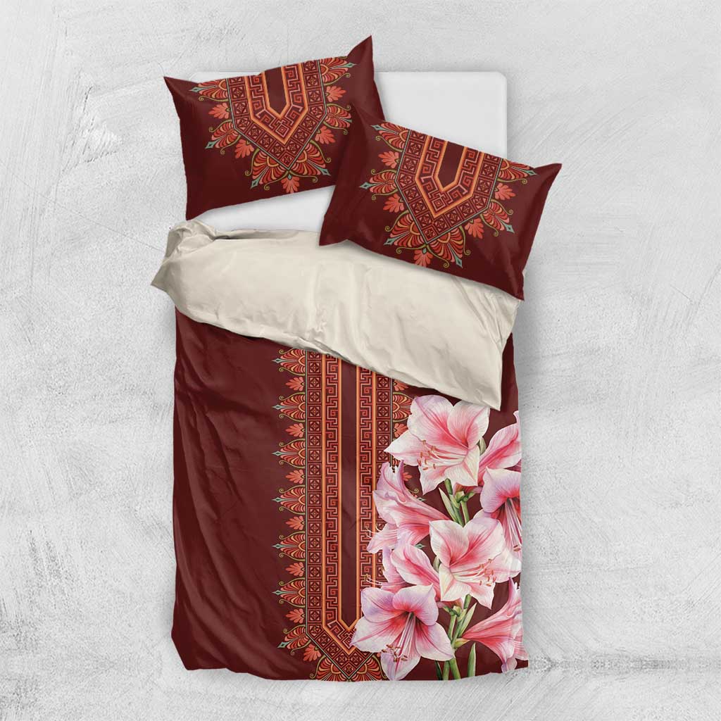 Burgundy duvet cover with red dashiki trim, pink lily print, and matching pillowcases