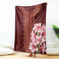 Dark red dashiki blanket with embroidered center panel and pink lily bouquet print