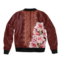 Red satin bomber jacket with black rib trim and large pink lily front graphic