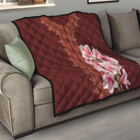 Maroon red quilt blanket with diamond stitching, decorative center border and pink lily print