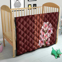 Red quilt panel with diamond stitching, ornate strip and pink floral lily print