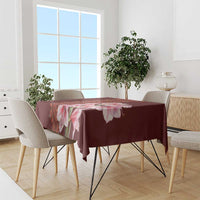 Red tablecloth featuring pink lilies with patterned center panel