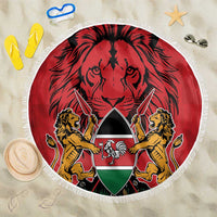 Round red beach blanket with lions-and-shield emblem, white fringe trim
