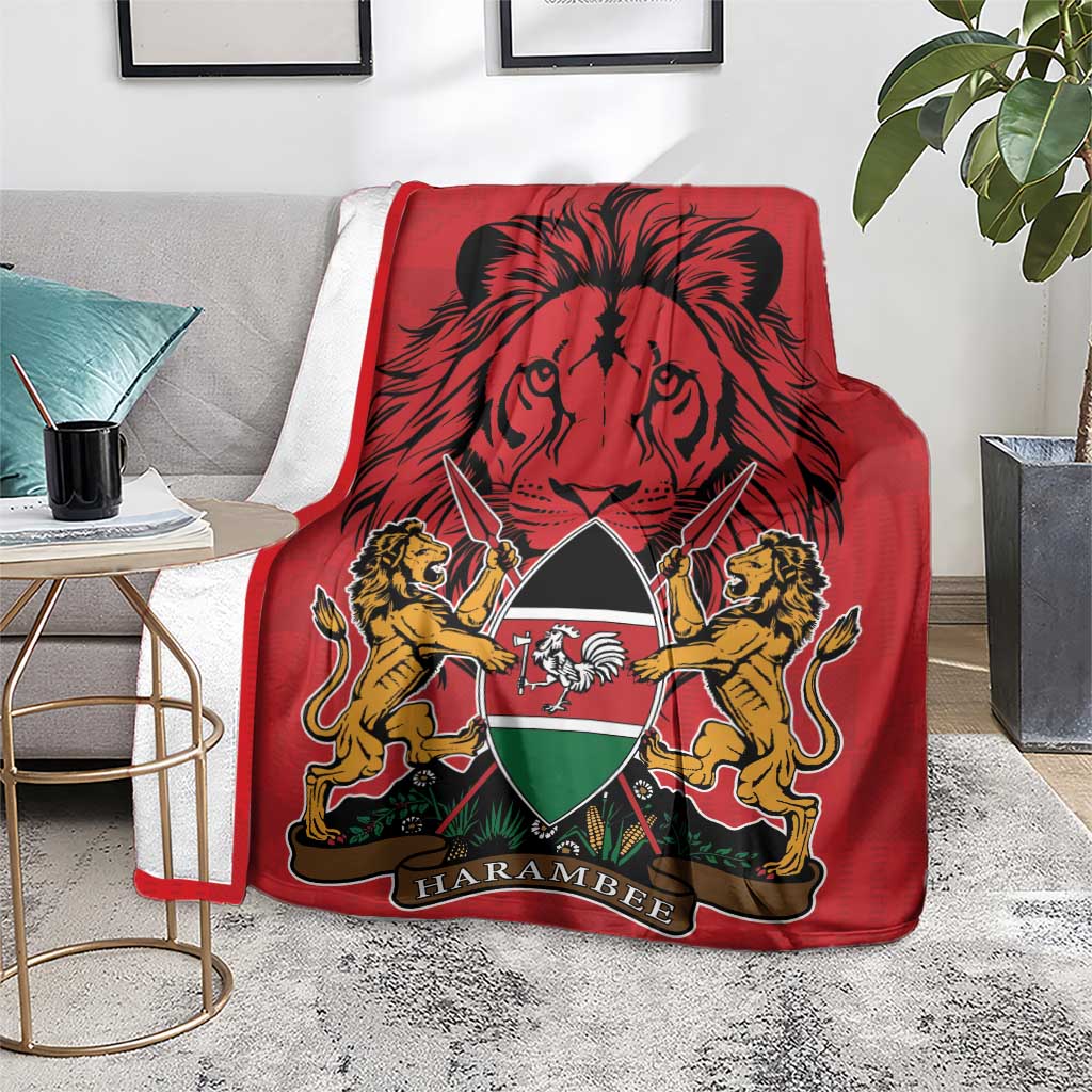 Red Kenya coat of arms blanket with lion graphic and Harambebe emblem, laid on rug