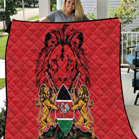 Red quilt with diamond stitching and Harambe coat of arms lion design
