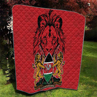 Red quilt with diamond pattern and Harambe coat of arms lion graphic