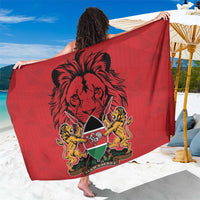 Red sarong with lion coat-of-arms emblem and HARAMBEE lettering