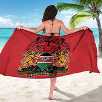 Red sarong with centered lion crest emblem and HARAMBEE band, shown from back