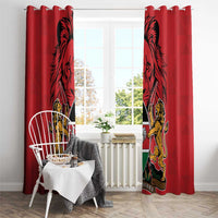 Red Kenya window curtains with coat of arms print, hung on a rod