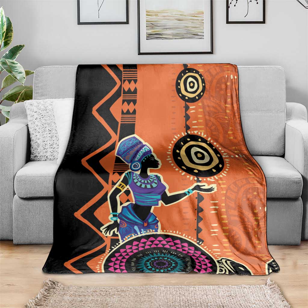 Orange and black ethnic blanket with illustrated African woman and geometric patterns