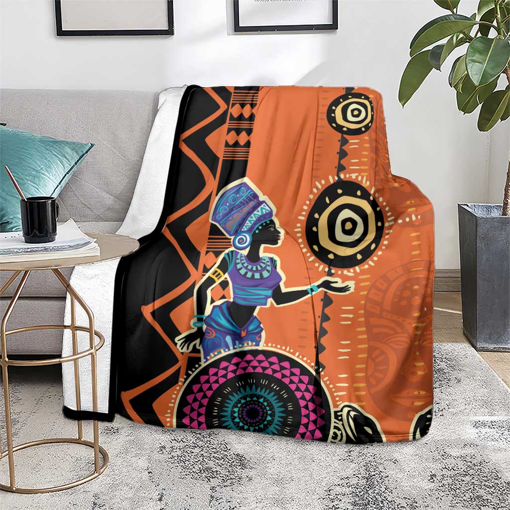 Orange and black ethnic blanket with African woman illustration, geometric border and mandala