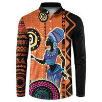 Orange and black button sweatshirt with colorful African-inspired portrait and geometric patterns