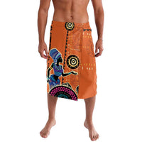 Orange lavalava wrap skirt with large front panel featuring circular and figure designs