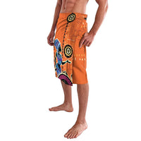 Orange lavalava wrap skirt with bold colorful animal and circle prints
