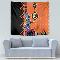 African woman ethnic dress tapestry featuring blue woman, purple halo, and orange geometric motifs