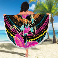 Round beach blanket with fringe, colorful African woman graphic on dark background