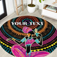 Personalized round rug with black background, multicolor African woman graphic and 'YOUR TEXT'.