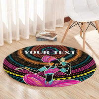 Personalized round rug with 'YOUR TEXT' center and colorful African woman design on dark base.