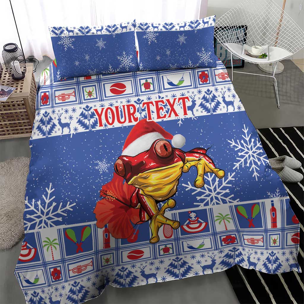 Blue Christmas bedding set with snowflake print, colorful tiles, and red Santa coqui